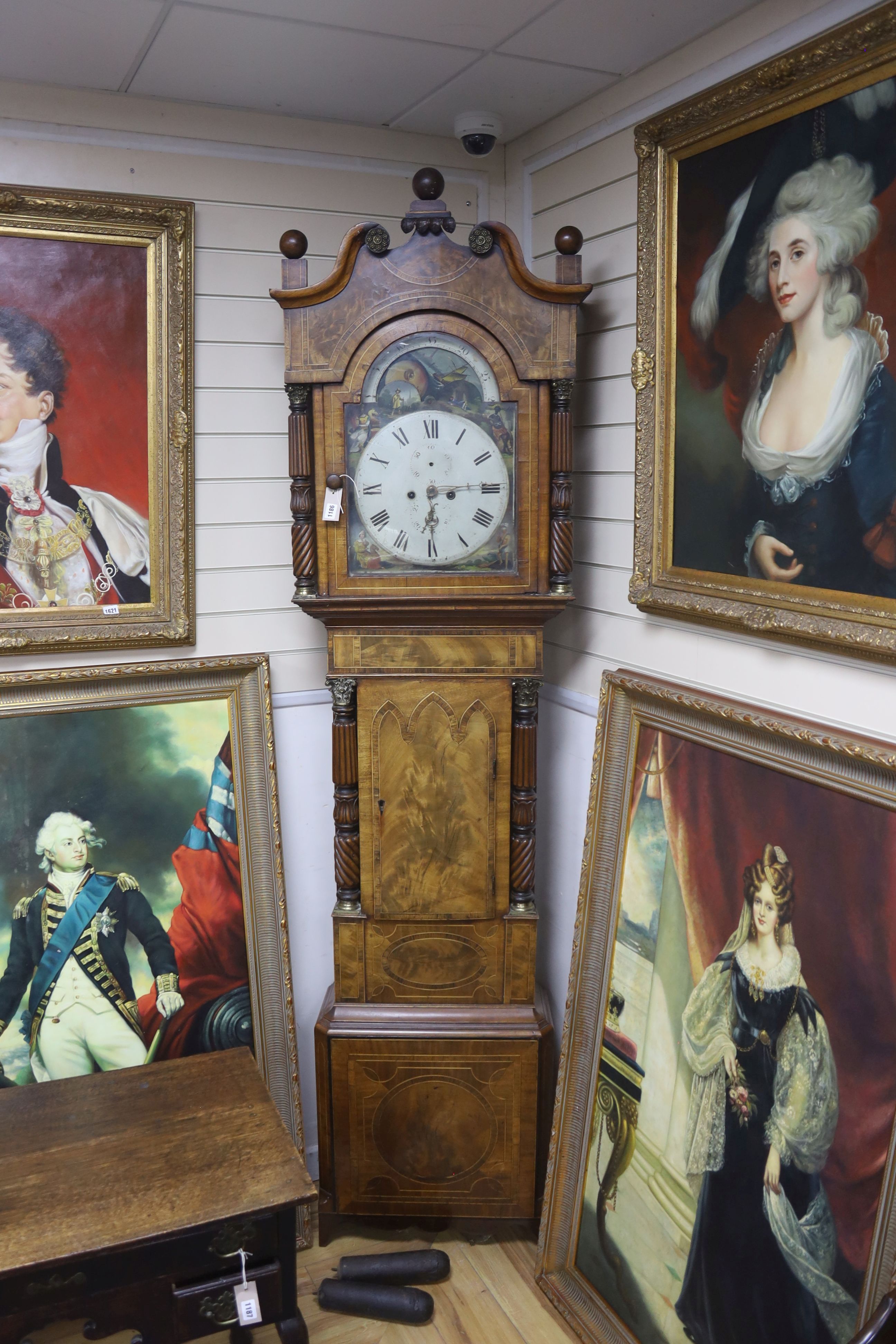 A Regency mahogany, rosewood banded and boxwood inlaid eight day longcase clock, height 242cm